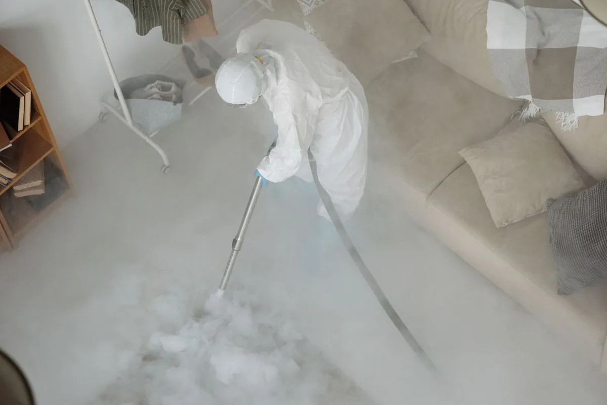 Biohazard cleanup technician in protective equipment, Farmington, UT